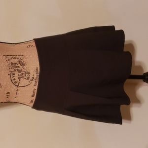 Black mini pleated skirt.